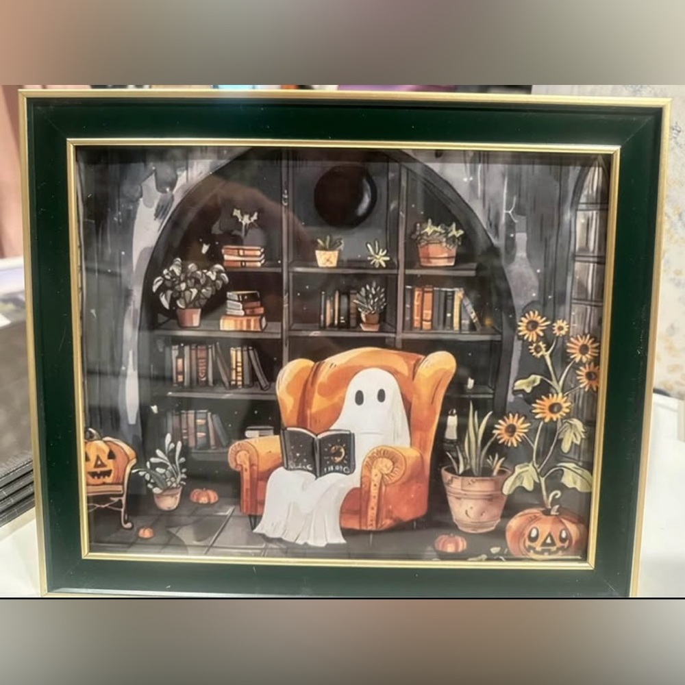 Cute Halloween print of a ghost reading a book in a library with a cat
